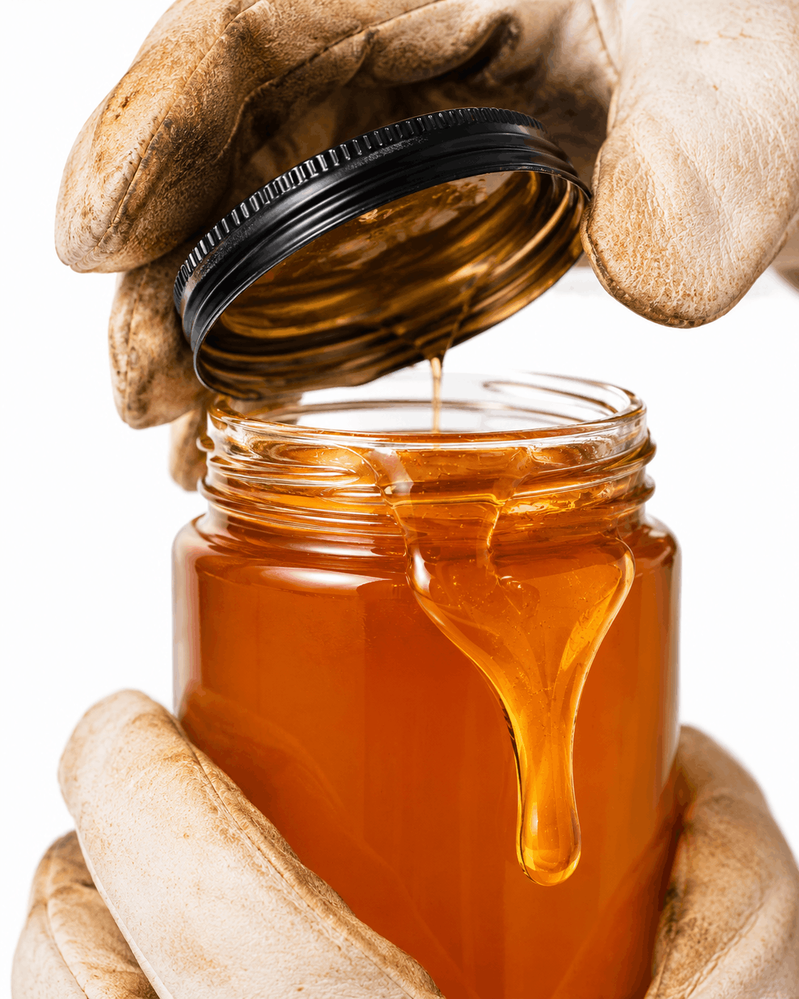 Honey drizzling from a NectarFusions jar